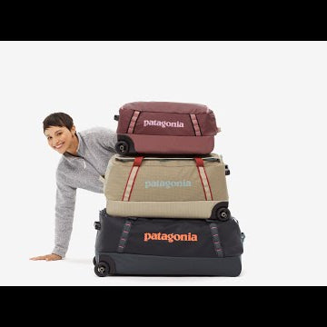 Black Hole Wheeled Duffel 70L